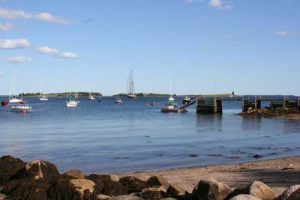 Freda Beach with a Tall Ship